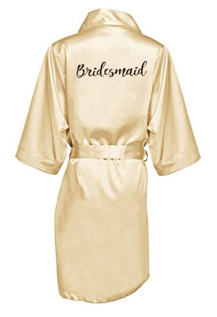 Župan s nápisem Bride