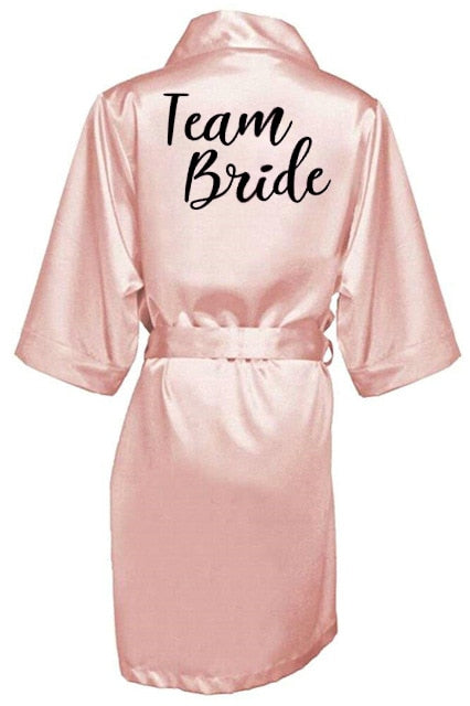 Župan s nápisem Bride