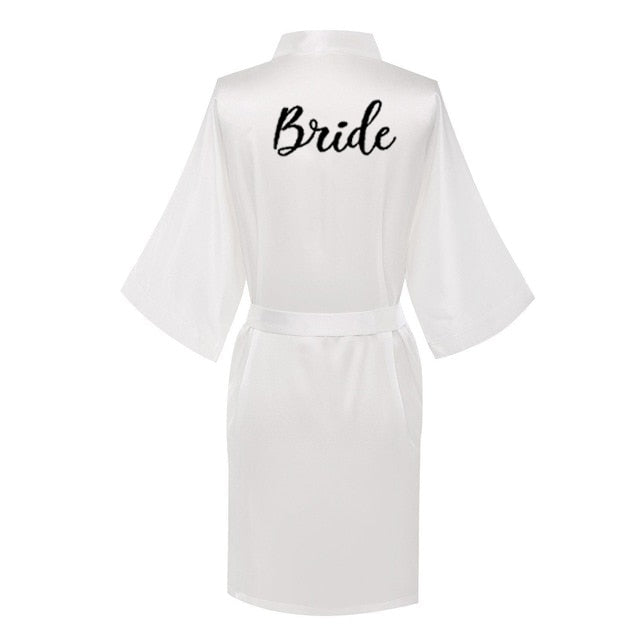 Župan s nápisem Bride