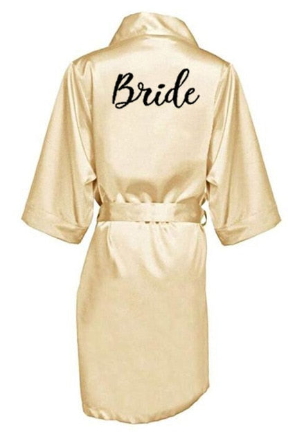 Župan s nápisem Bride