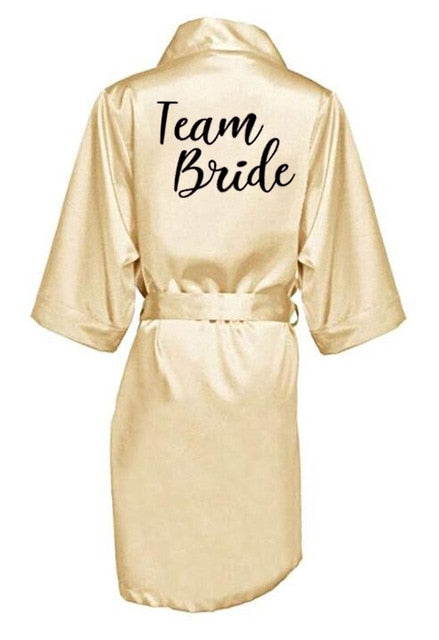 Župan s nápisem Bride