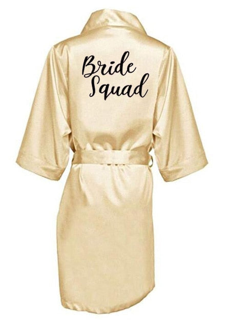 Župan s nápisem Bride