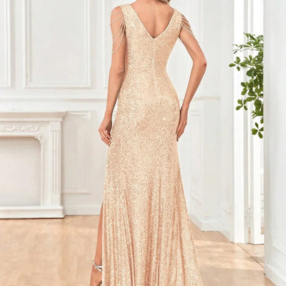 Dámské elegantní třpytivé šaty s rozparkem