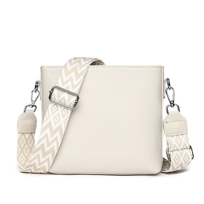 Dámská kožená crossbody kabelka s popruhem